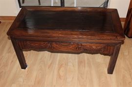 Narrow Asian coffee table.