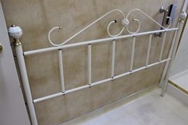 Hollow metal full size headboard.