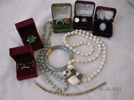 14k, jade, diamonds, opal, ivory.  