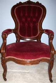                     Ornate Victorian tuft back arm chair