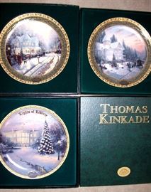     Three Thomas Kinkade collector's plates & boxes