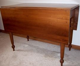                     Drop leaf solid wood antique table