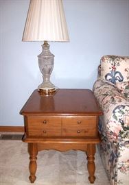                       One of a pair of maple end tables