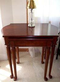                   Two stack tables w/spoon foot legs