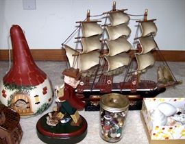   Ship, painted gourd, carved hiker, buttons & sea shells