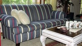 red blue, cream sofa / painted coffee table