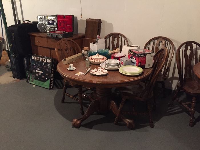 We have 2 great wood kitchen or dining sets 1 has 6 chairs the other is just a great round table
