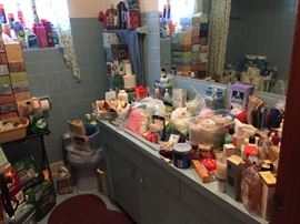 Plenty of toiletries cleaning supplies perfumes and we still have 3 rooms to go