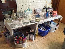 Everyday kitchen items many unopened and unused from tupperware to Baggies