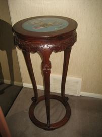 Carved wood plant stand with cloisoine inset