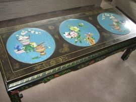 Cocktail table with cloisoine inserts