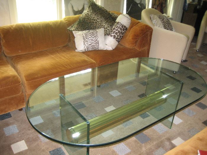 Glass top cocktail table
