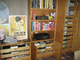 Movies recorded on tape, books on Hollywood, silver screen version of Trivial Pursuit, film artwork