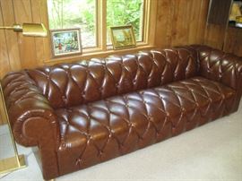 Tufted brown sofa