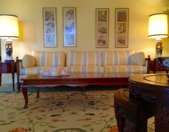 Wood Framed Upholstered Sofa, Coffee Table, Pair of Table Lamps, Pair of End Chests, Framed Asian Prints