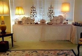 DISH & GLASSWARE TO MIX & MATCH FOR ENTERTAINING: Dishes (Limoges & Creamware) Serving Pieces (Platters & Trays, including Teak Handled, Silver Roast Carving Stand) for Elegant Dining & Entertaining, Pair of "Lily" Altar Candelabra, with bouquets rising dramatically from two-handled brass vases  