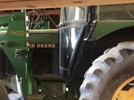 John Deer Tractor- 1990 Model # 2355 with front end loader and 6 foot John Deere Bush Hog #705.  Tractor has 4,268 miles