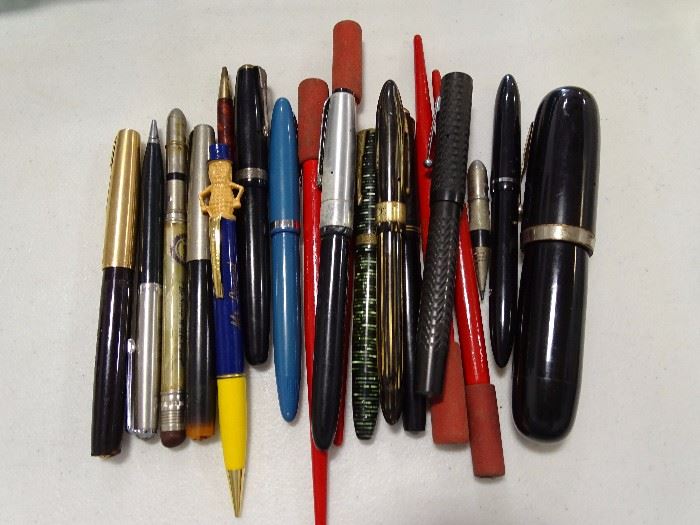 Pens, fountain and ball point and pencils.
