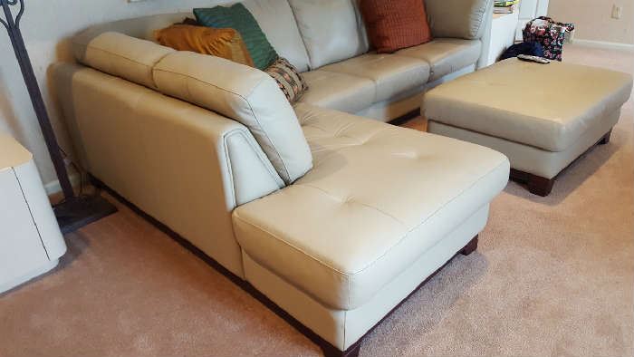 Tan leather sectional and ottoman   $1,200  Reduced to $995
