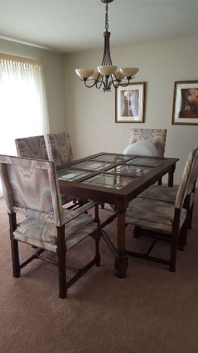 Glass top table with 6 upholstered chairs - $450  Reduced to $350