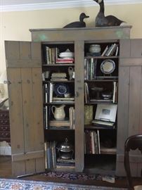 Primitive cabinet, decoys, art books