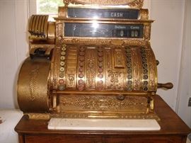 Antique brass cash register by National Cashregister