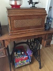 Antique sewing machine with stand