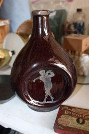 PINCH POTTERY JUG WITH SPORT MOTIFF