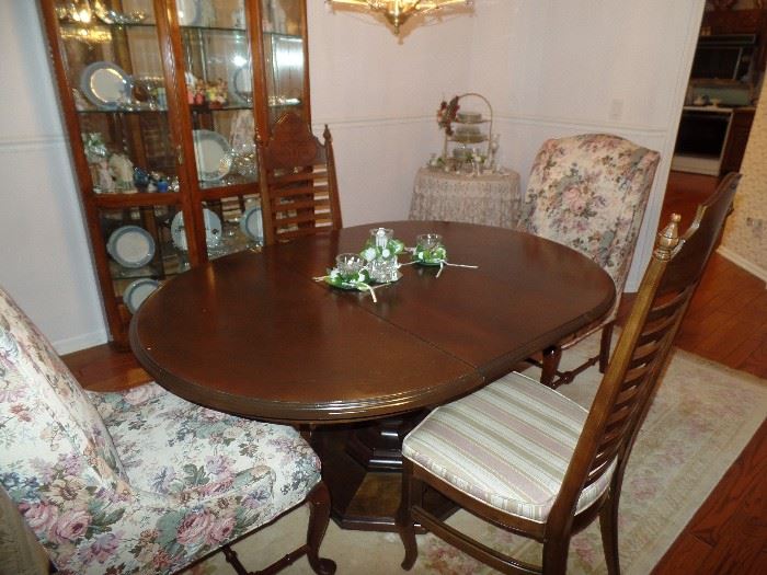 Dining room table w/ 4 ladder back chairs, 2 upholster end chairs, and 2 leaves