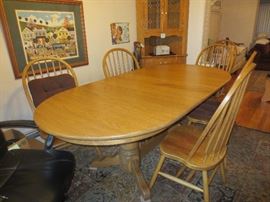 Oak dining table for six, comes with two leaves