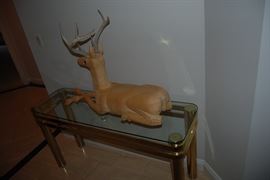 Hand carved wooden deer.