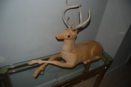 Hand carved wooden deer.