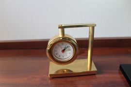Brass desk clock.