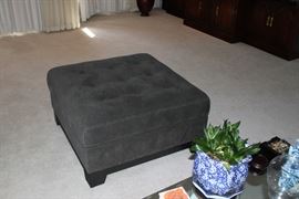 Ultra suede manufactured large ottoman.