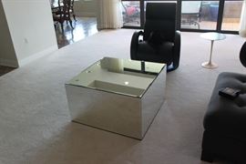 Beveled mirror coffee table.