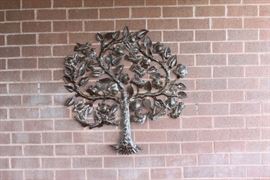 Metal tree plaque.