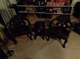 More oriental carved chairs.