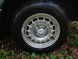 Nice OEM Wheel , Car has Michelin Tires, 30-40% tread remaining.