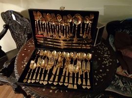 W.M. Rogers gold plate flatware, service for 12.