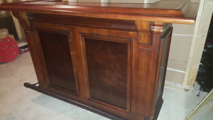 Cherry wood bar. Never been used! Please look at multiple pictures. Brass accents, sink, storage and cabinets 74"w x 28.5"d x 43"h  $2300.00