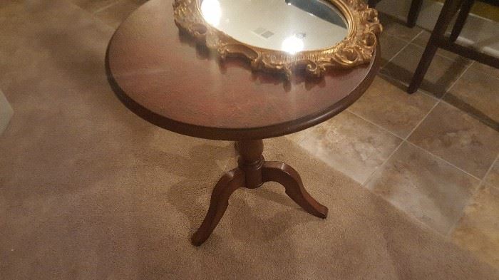 pedestal side table 24"w x 25"h, wood with floral accent on top $65.00