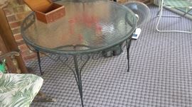 Glass top patio table