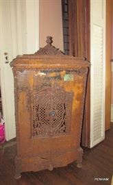 Very old iron Holland wood heater.