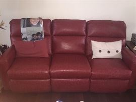 Red Faux leather reclining sofa and love seat