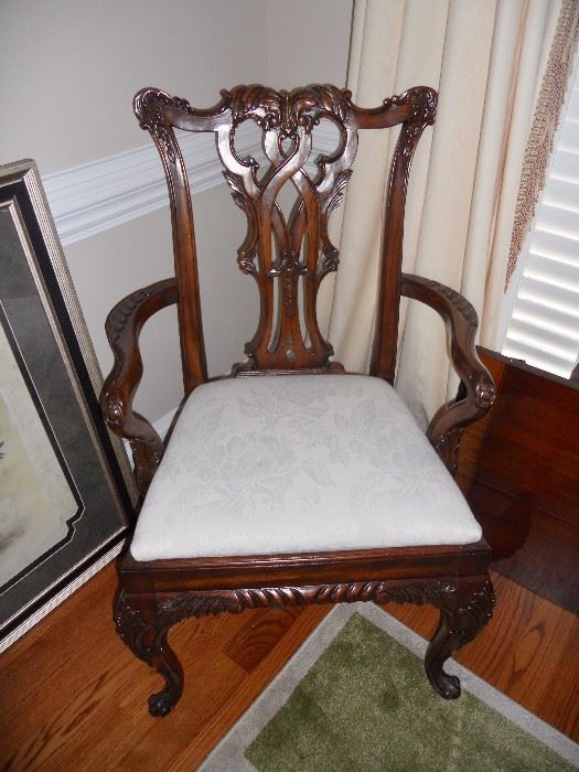 One of 10 Chippendale style chairs that match dining suite