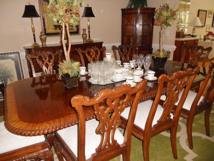 Elegant mahogany dining suite Chippendale style--10 matching chairs, 2 leaves and table pads--------set of Royal Doulton "Pavanne" pattern on table