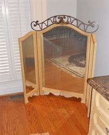 Triple mirror that tops dresser (off because a flat screen TV replaced it)