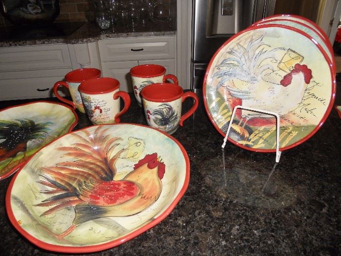 Rooster themed plates, cups and serving pieces