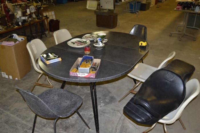 Vintage Dining Table. Chairs not original but can be purchased seperately. Harley Softail Seat, Vintage honda, kawasaki, or suzuki seat.