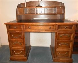 Desk with center inlaid with leather blotter and desktop organizer